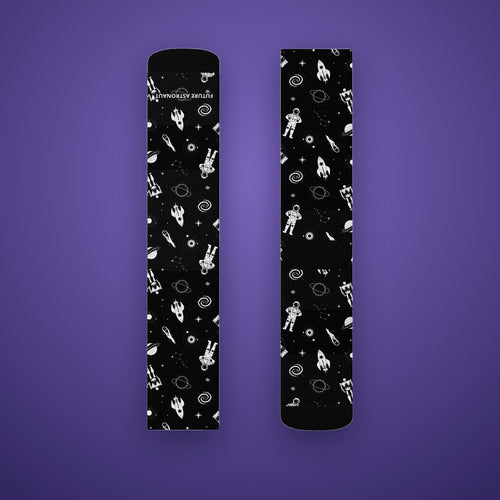 Astronaut Crew Socks on Future Astronaut branded background, white astronauts, rockets and planets on black